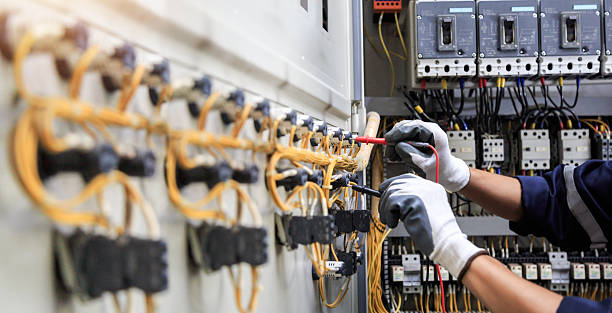 Professional Electrician technician working in Dunes City, OR